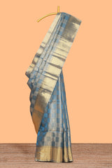 Blue checked zari motifs art tissue saree with self zari border and matching blouse