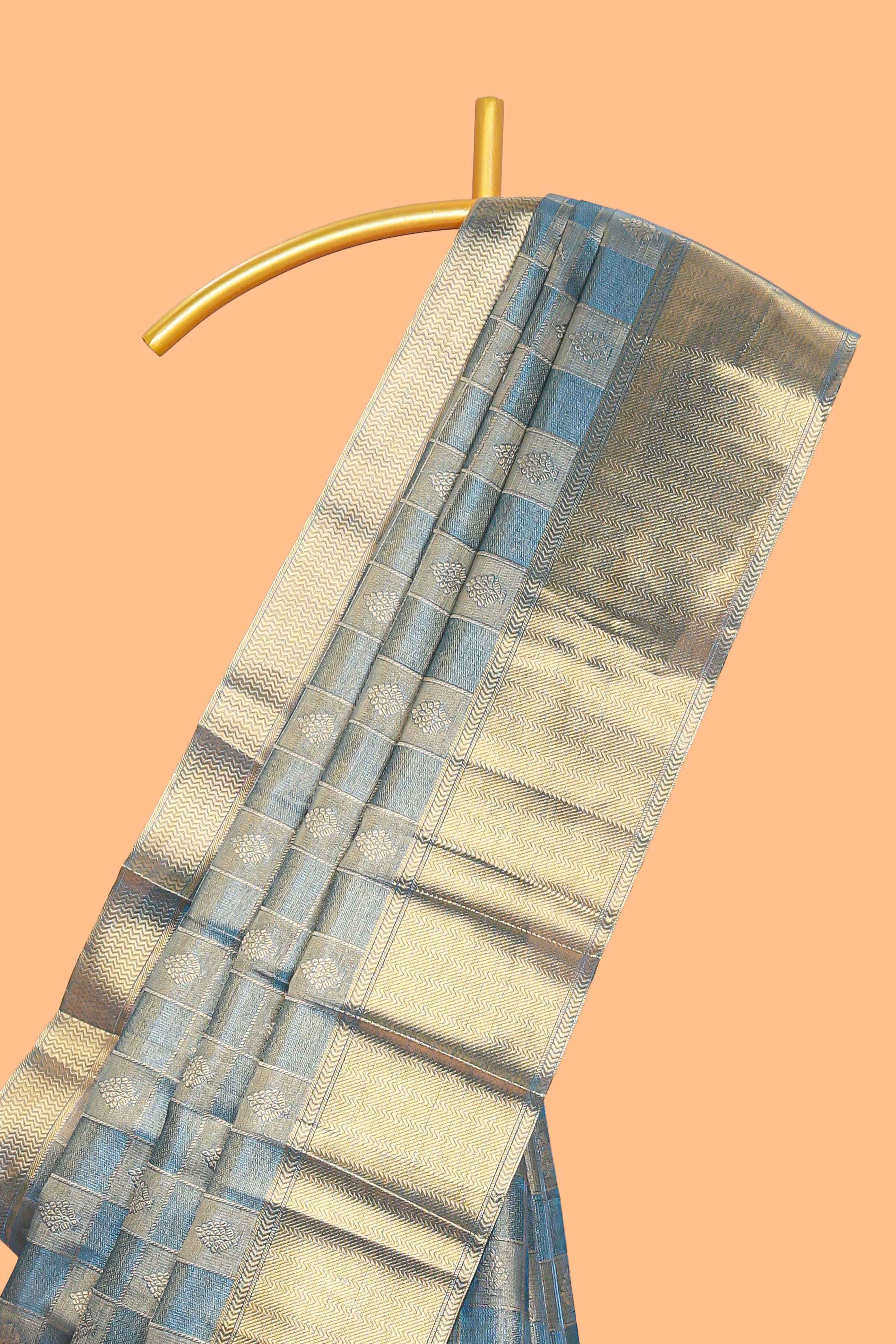 Blue checked zari motifs art tissue saree with self zari border and matching blouse