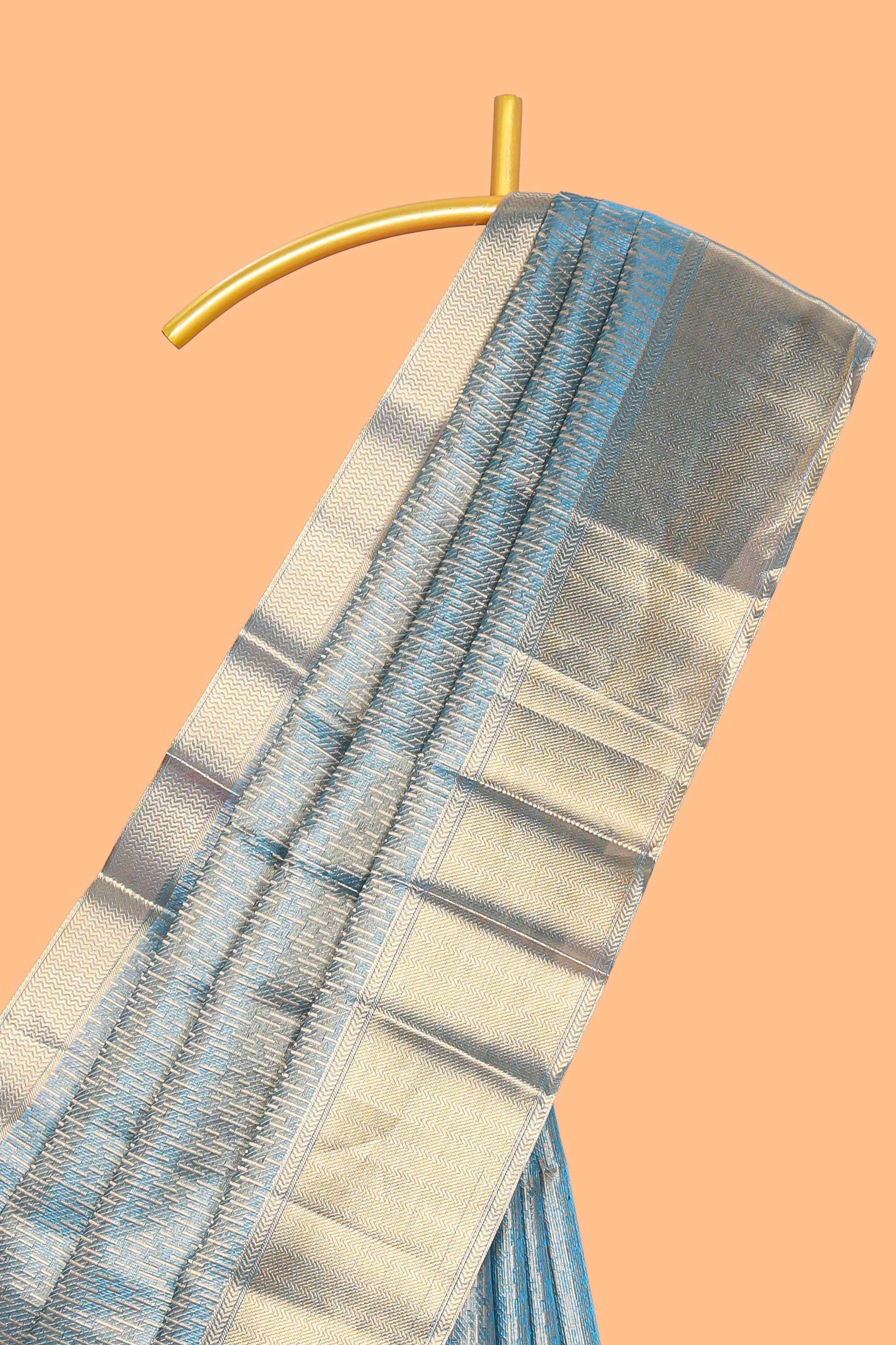 Blue geometric zari motifs art tissue saree with self zari border and matching blouse