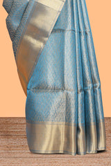 Blue geometric zari motifs art tissue saree with self zari border and matching blouse