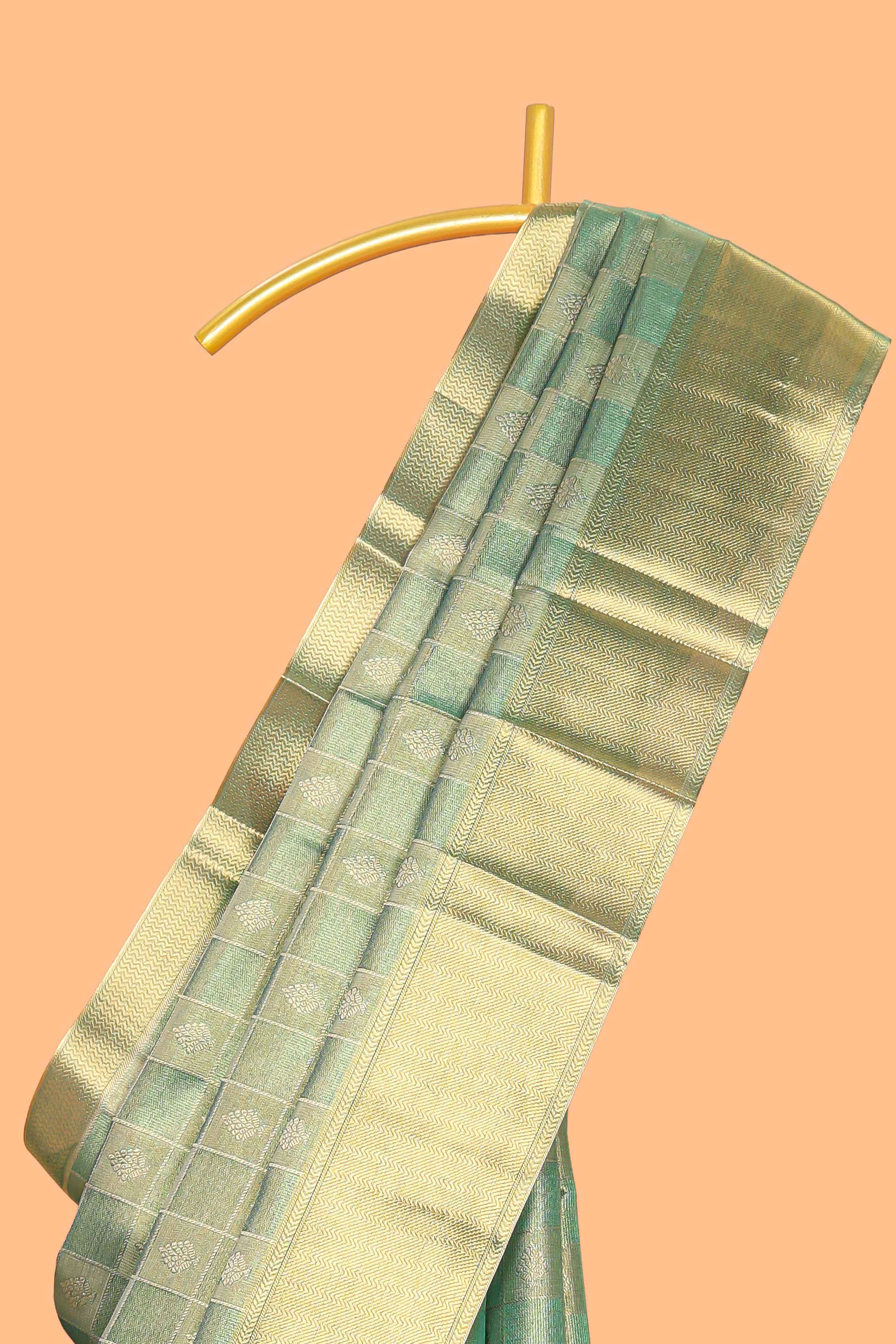 Green checked zari motifs art tissue saree with self zari border and matching blouse