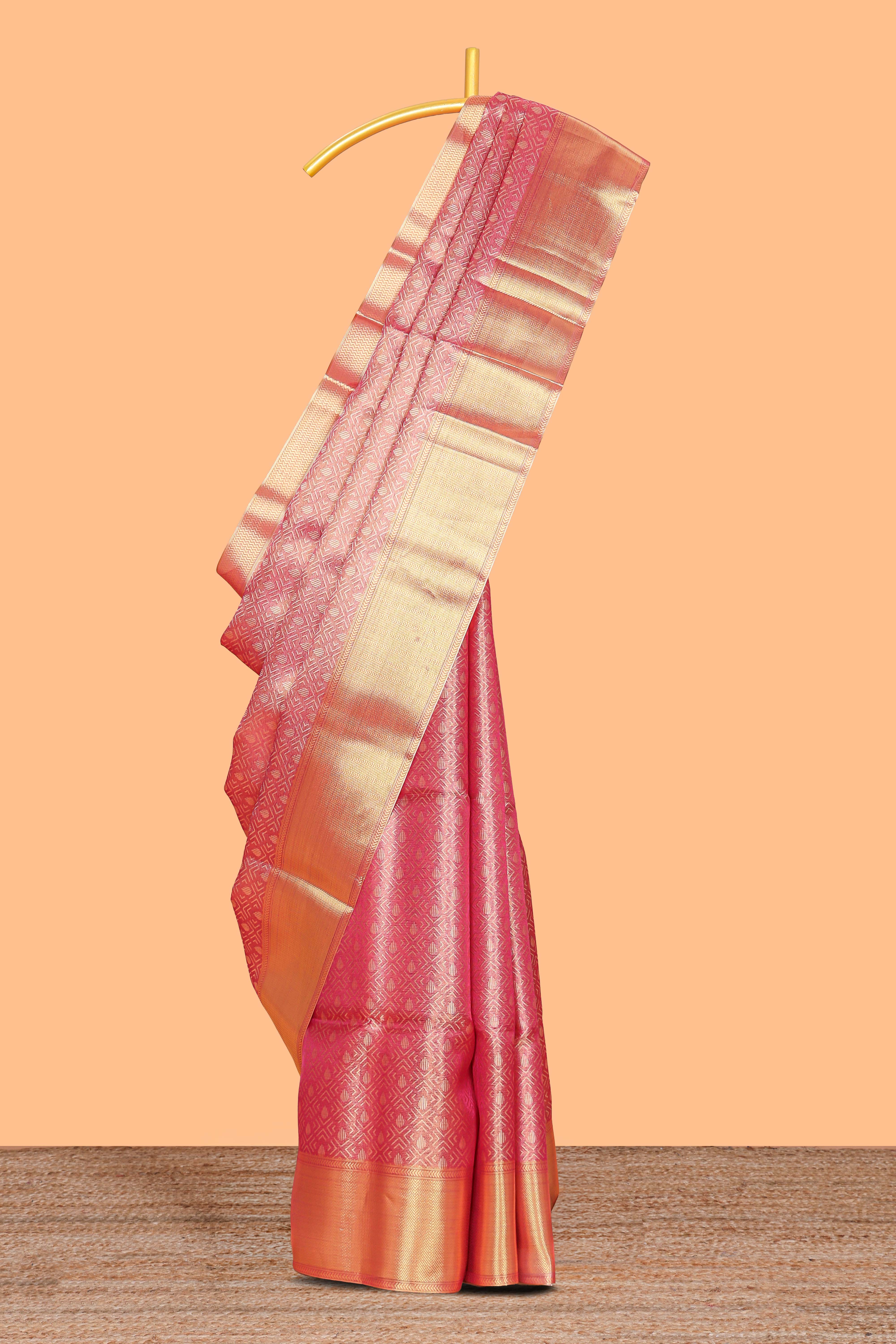 Pink geometric zari motifs art tissue saree with self zari border and matching blouse