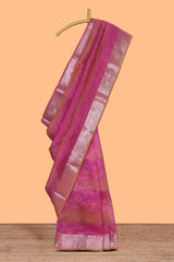 Pink crush art tissue saree with self floral design border and contrast zari blouse