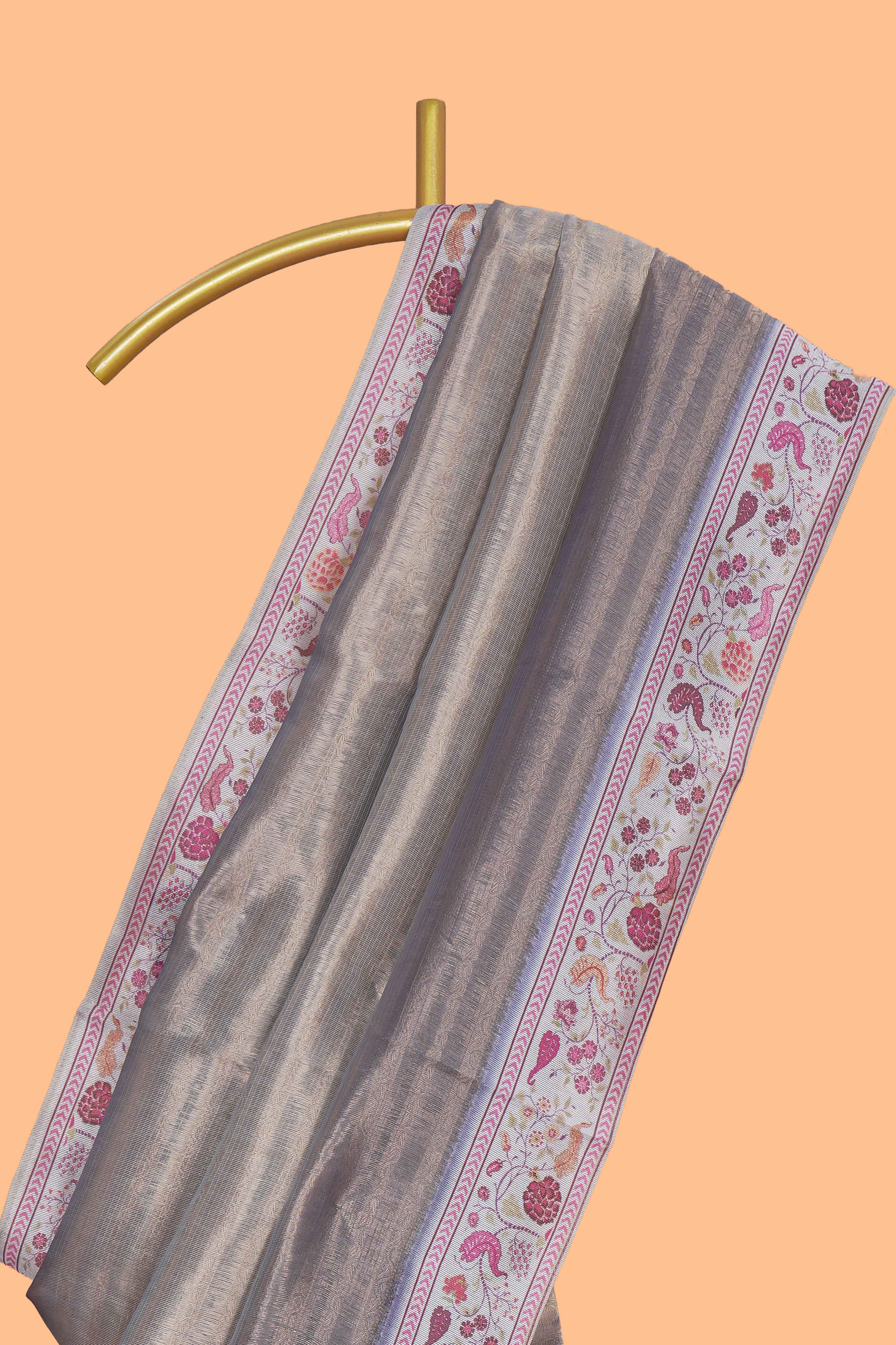 Grey striped art tissue saree with contrast floral design border and matching blouse
