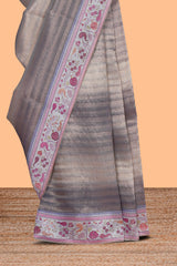 Grey striped art tissue saree with contrast floral design border and matching blouse