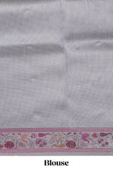 Grey striped art tissue saree with contrast floral design border and matching blouse