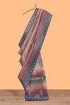 Multi color striped art tissue saree with contrast border and plain blouse