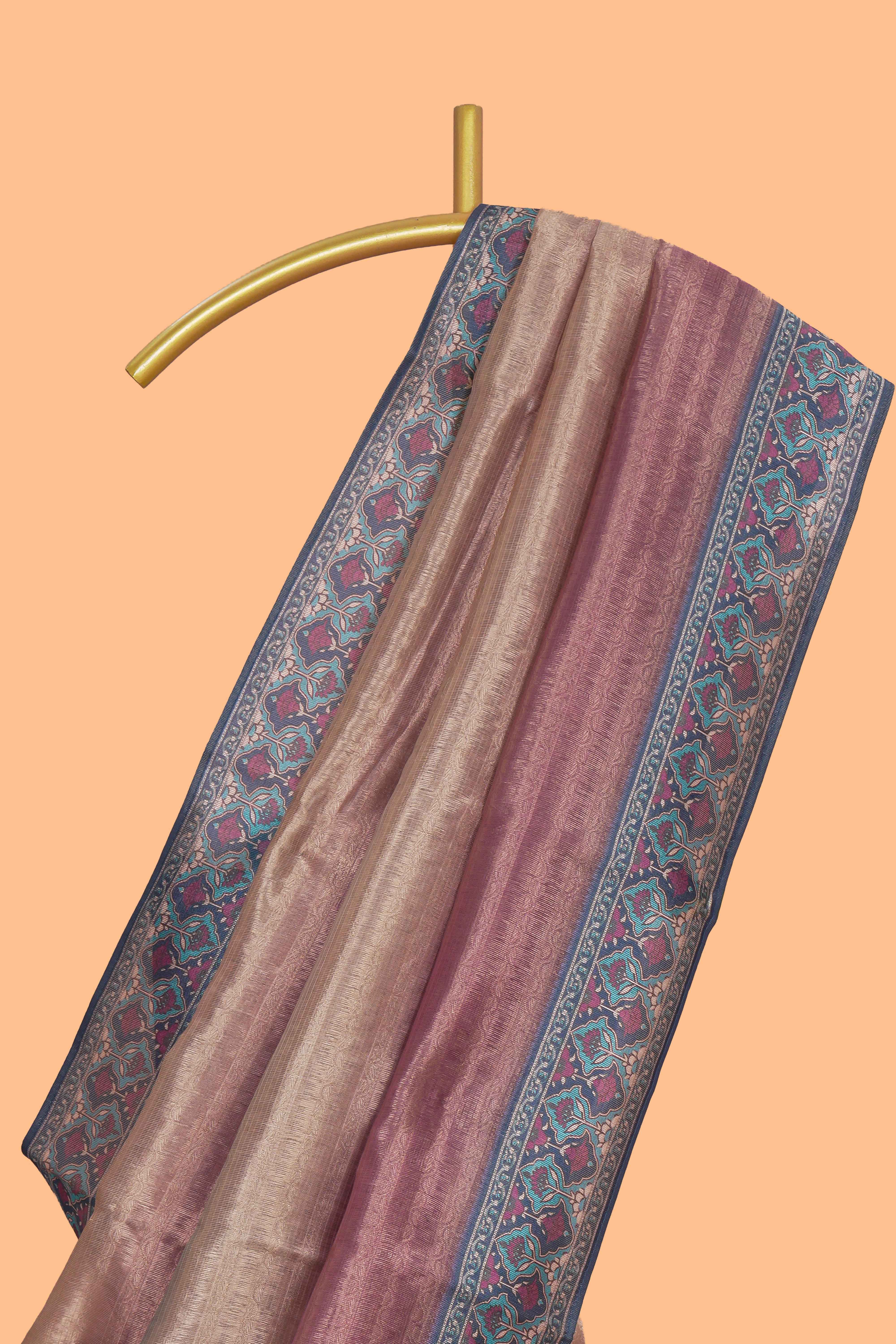 Multi color striped art tissue saree with contrast border and plain blouse