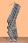 Multi color striped art tissue saree with contrast border and plain blouse