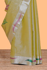 Green peacock feather design tissue saree with self zari border and contrast blouse