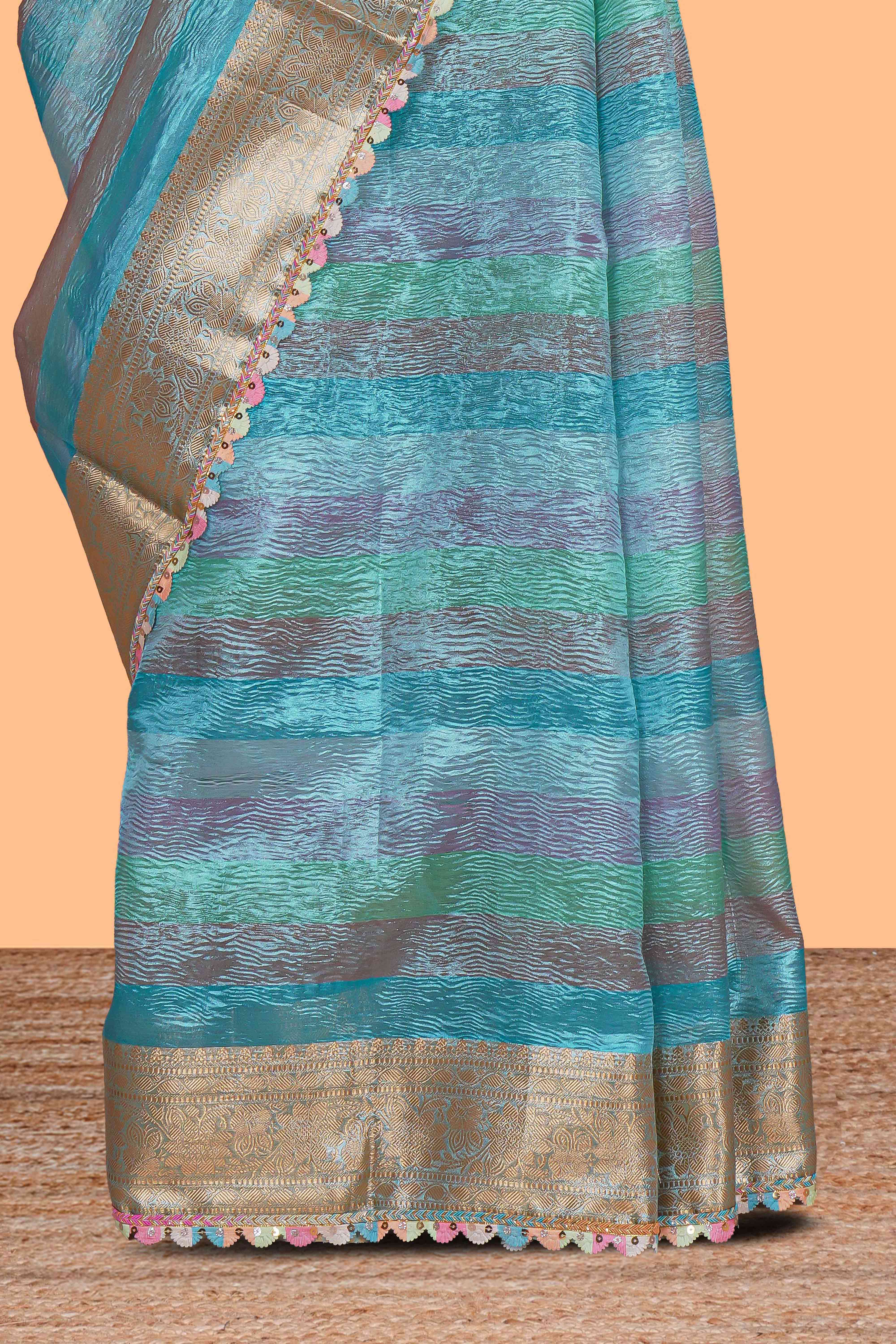 Multi color crush art tissue saree with self design border and matching zari blouse