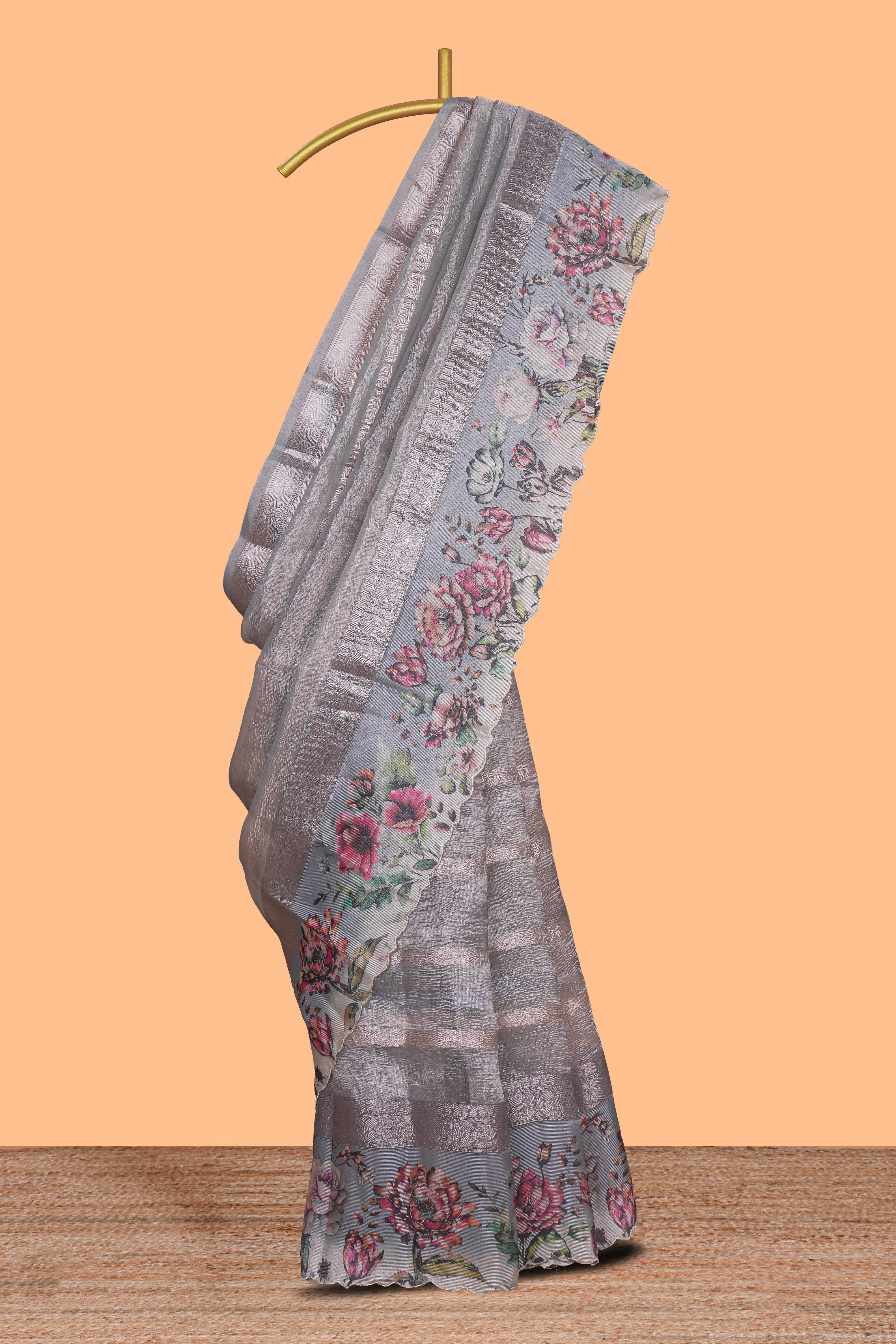 Grey striped design crush tissue saree with contrast floral border and matching blouse