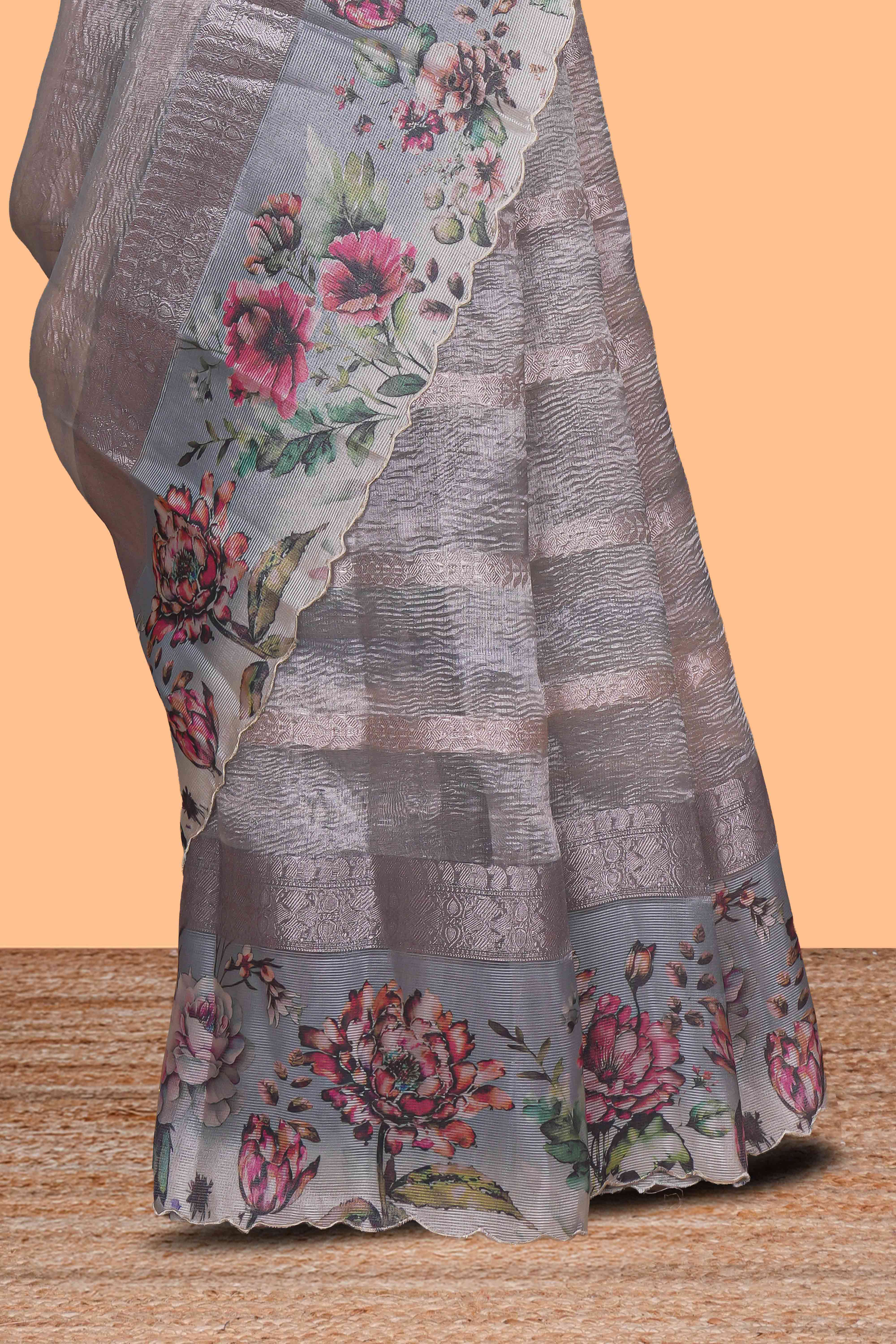 Grey striped design crush tissue saree with contrast floral border and matching blouse
