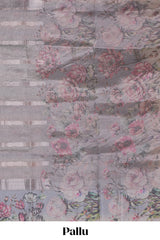 Grey striped design crush tissue saree with contrast floral border and matching blouse