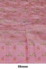 Peach striped design crush tissue saree with contrast floral border and matching blouse