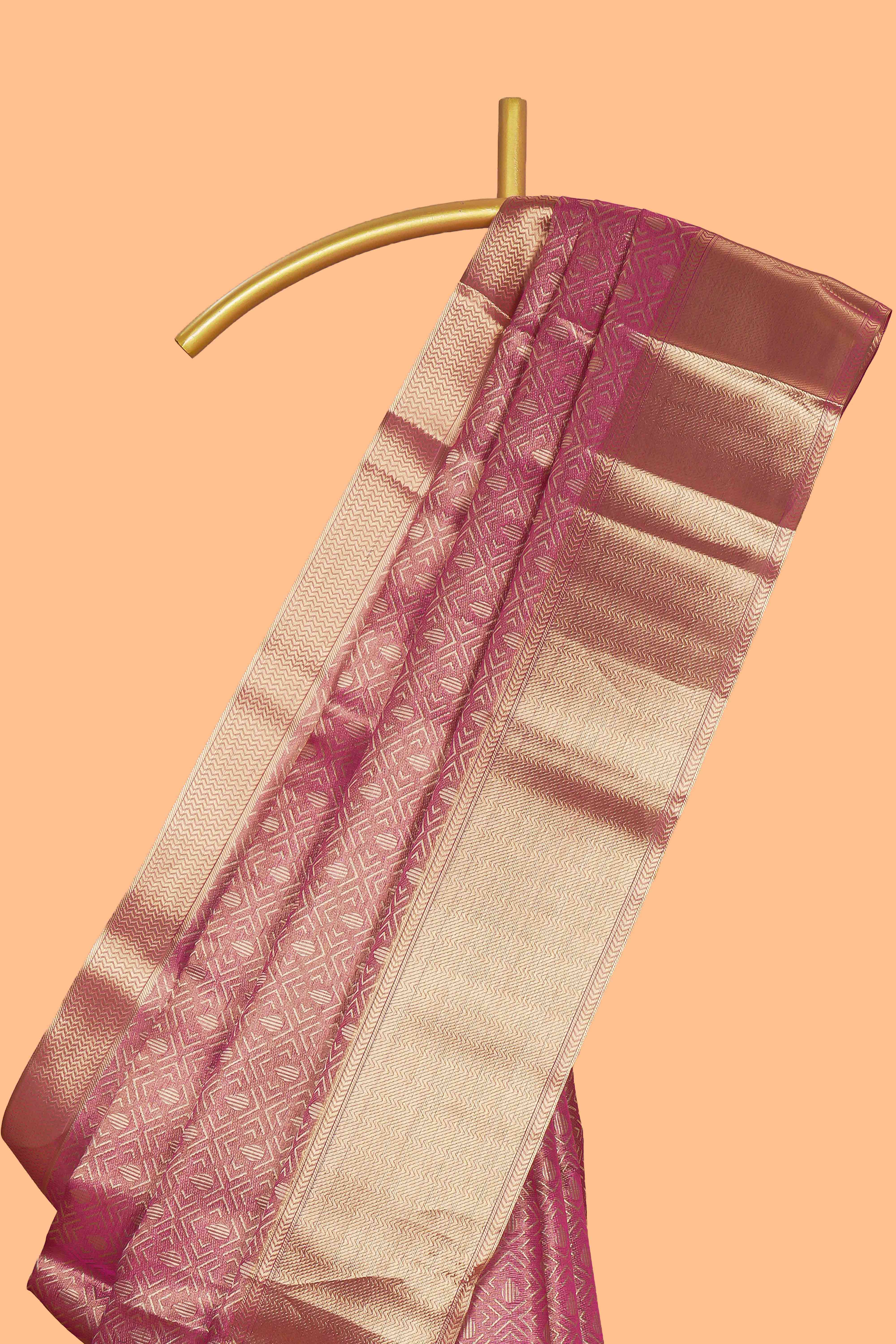 Pink geometric zari design art tissue saree with self zari border and matching blouse
