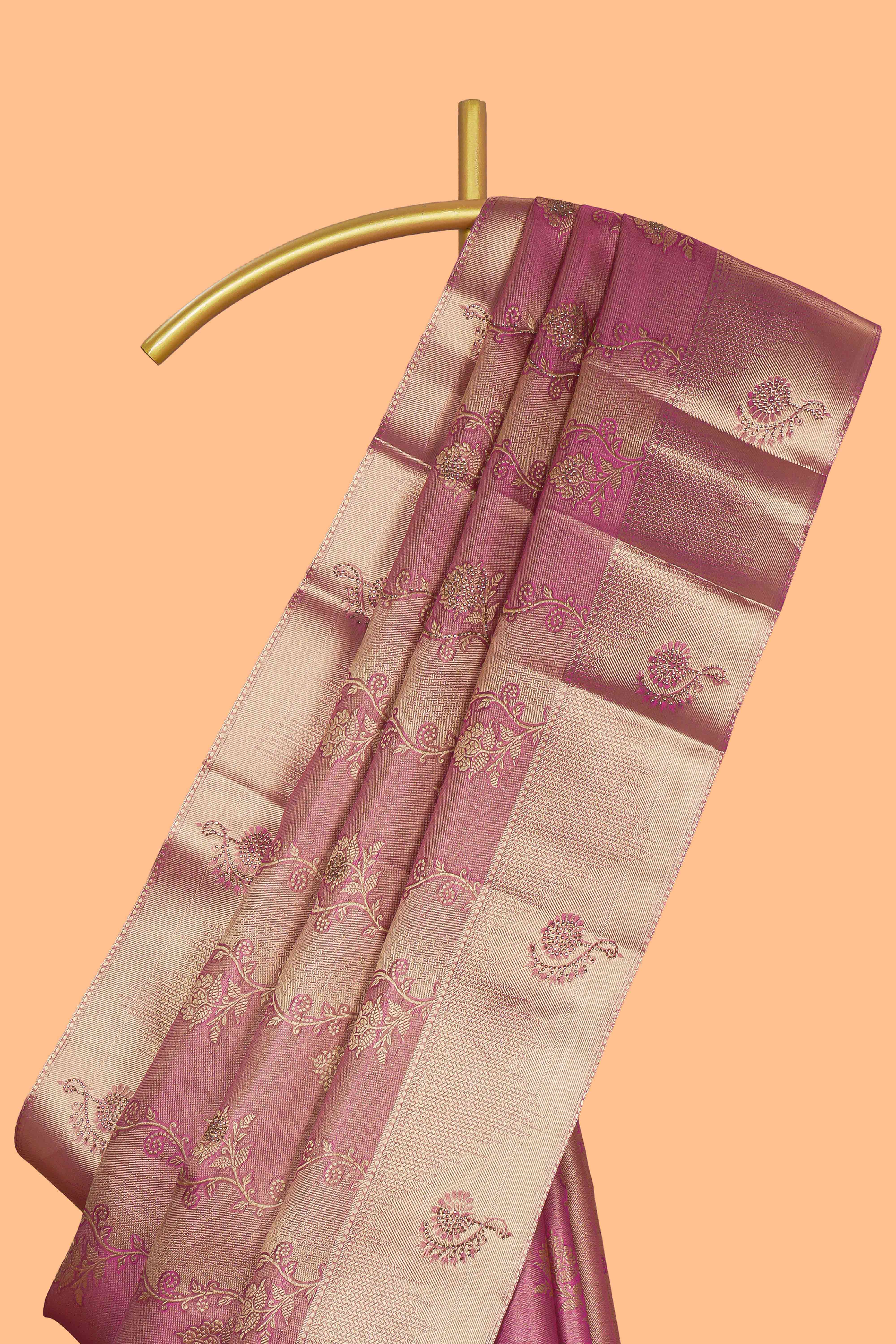 Pink floral vine design art tissue saree with self zari border and contrast blouse