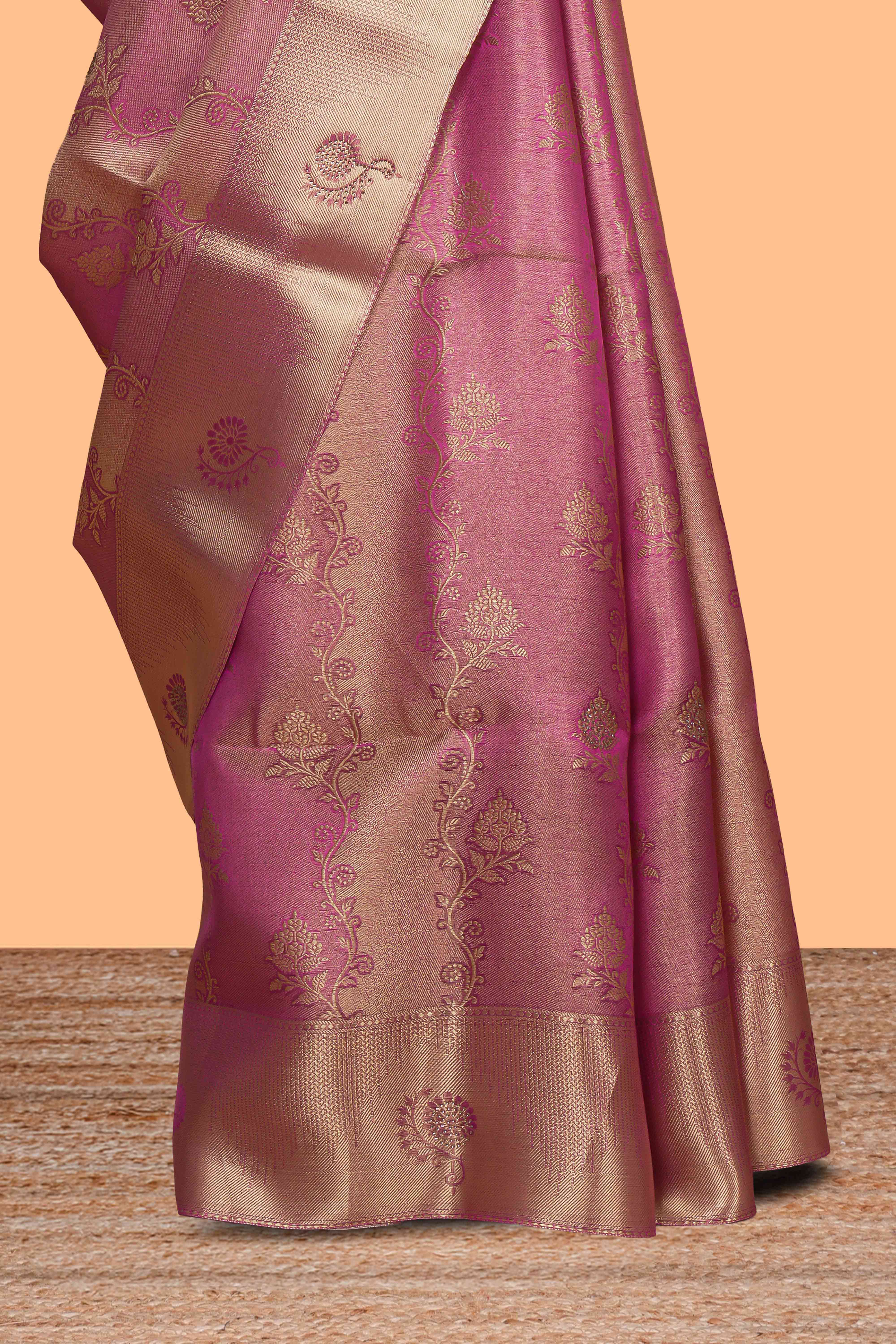 Pink floral vine design art tissue saree with self zari border and contrast blouse