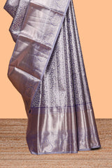 Lavender silver zari floral design art tissue saree with self zari border and matching blouse