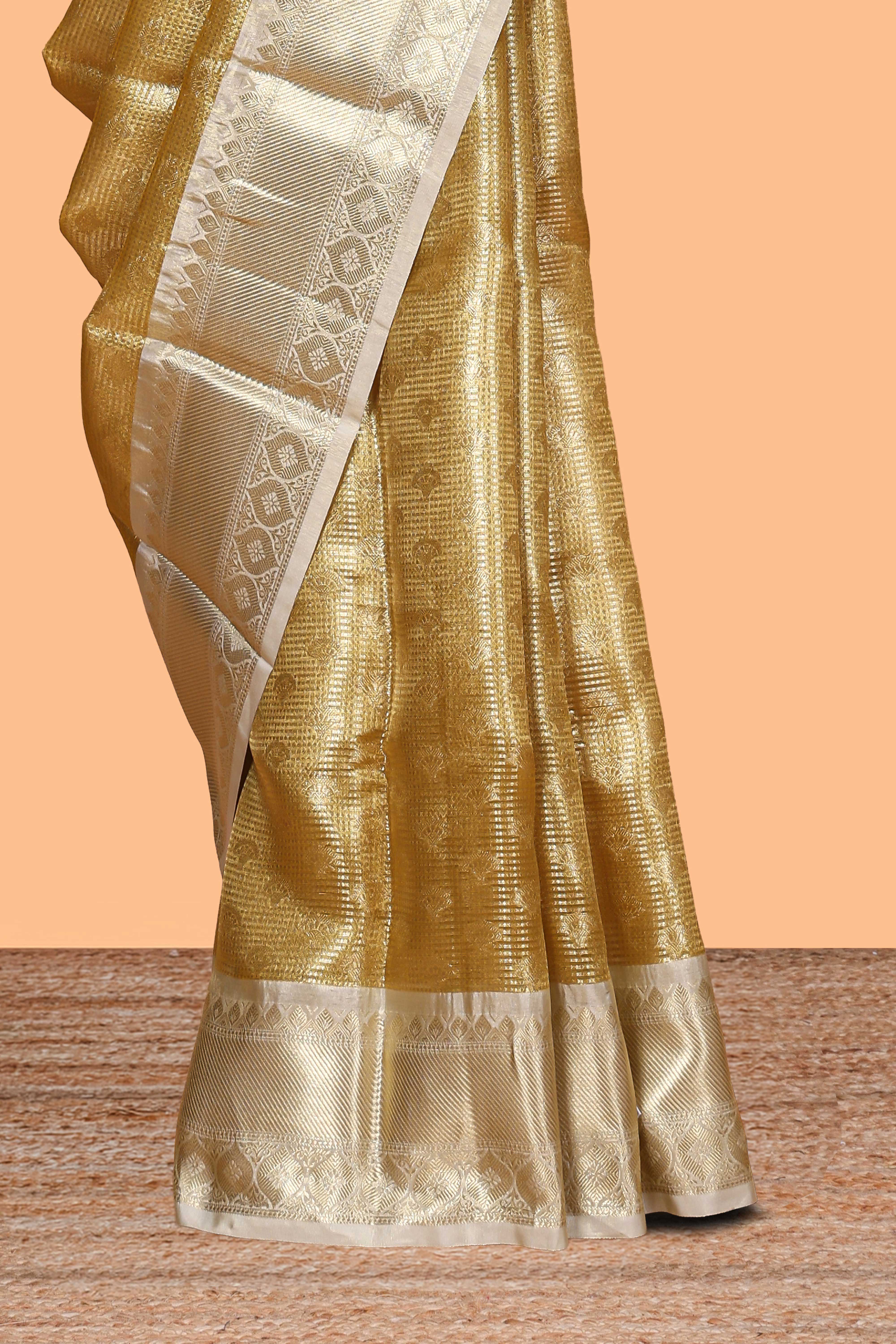 Golden zari motifs design art tissue saree with contrast zari border and blouse