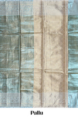 Blue checked zari motifs design art tissue saree with Self zari border and contrast blouse