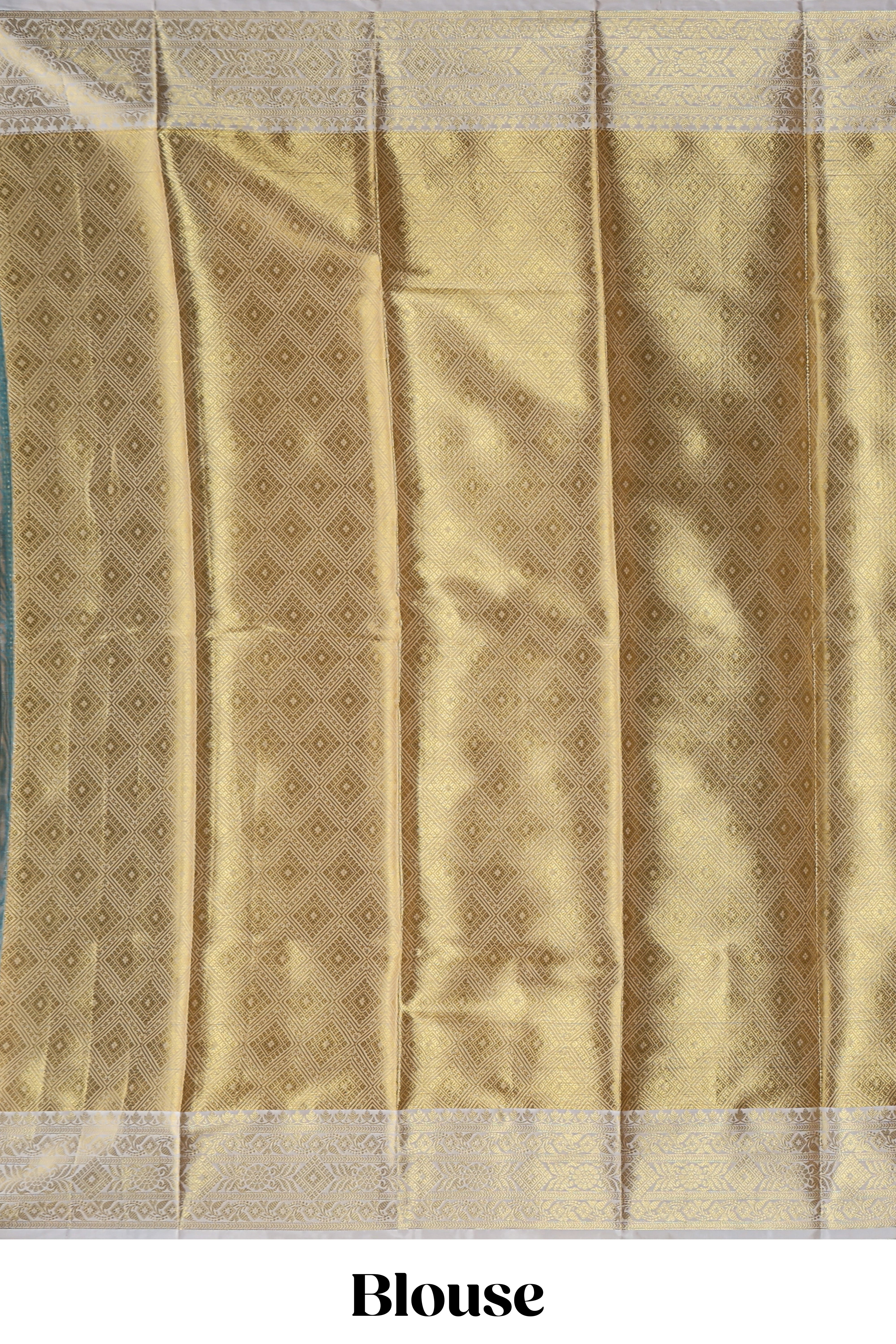 Green zari design art tissue saree with contrast zari border and motifs blouse