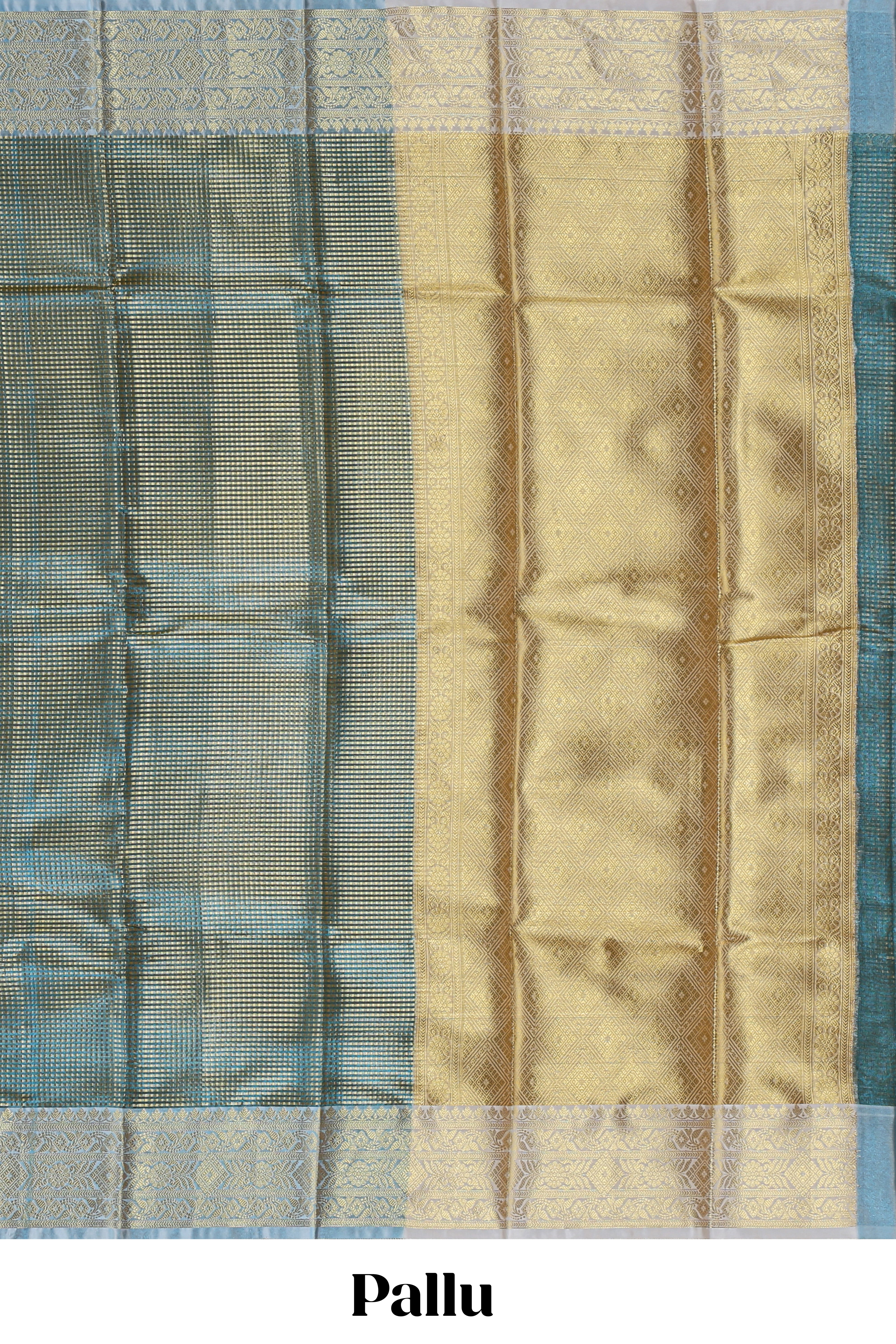 Blue zari design art tissue saree with self zari border and contrast motifs blouse