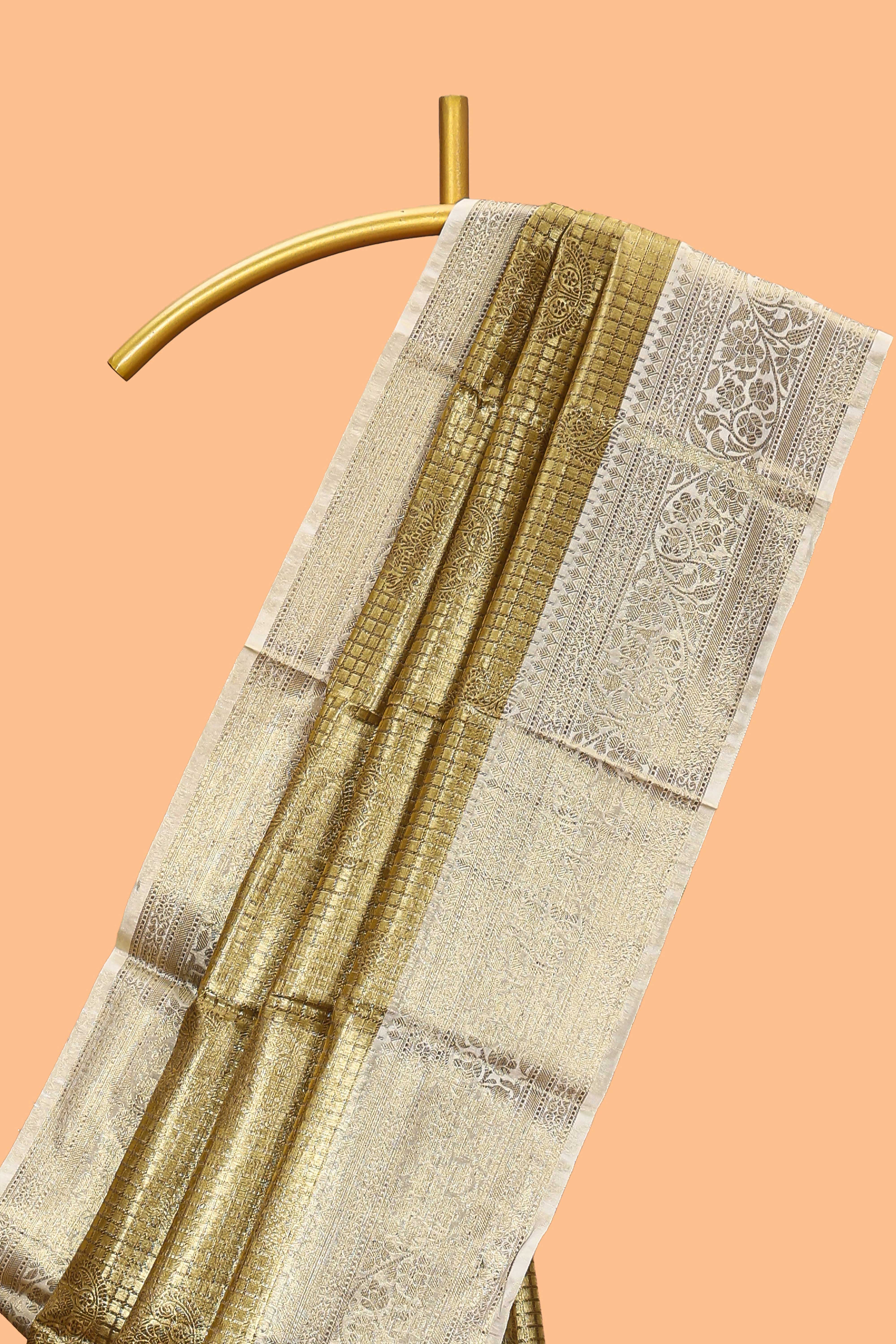 Golden zari checked motifs design art tissue saree with contrast zari border and matching blouse