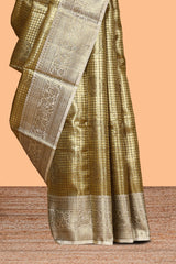 Golden zari checked motifs design art tissue saree with contrast zari border and matching blouse