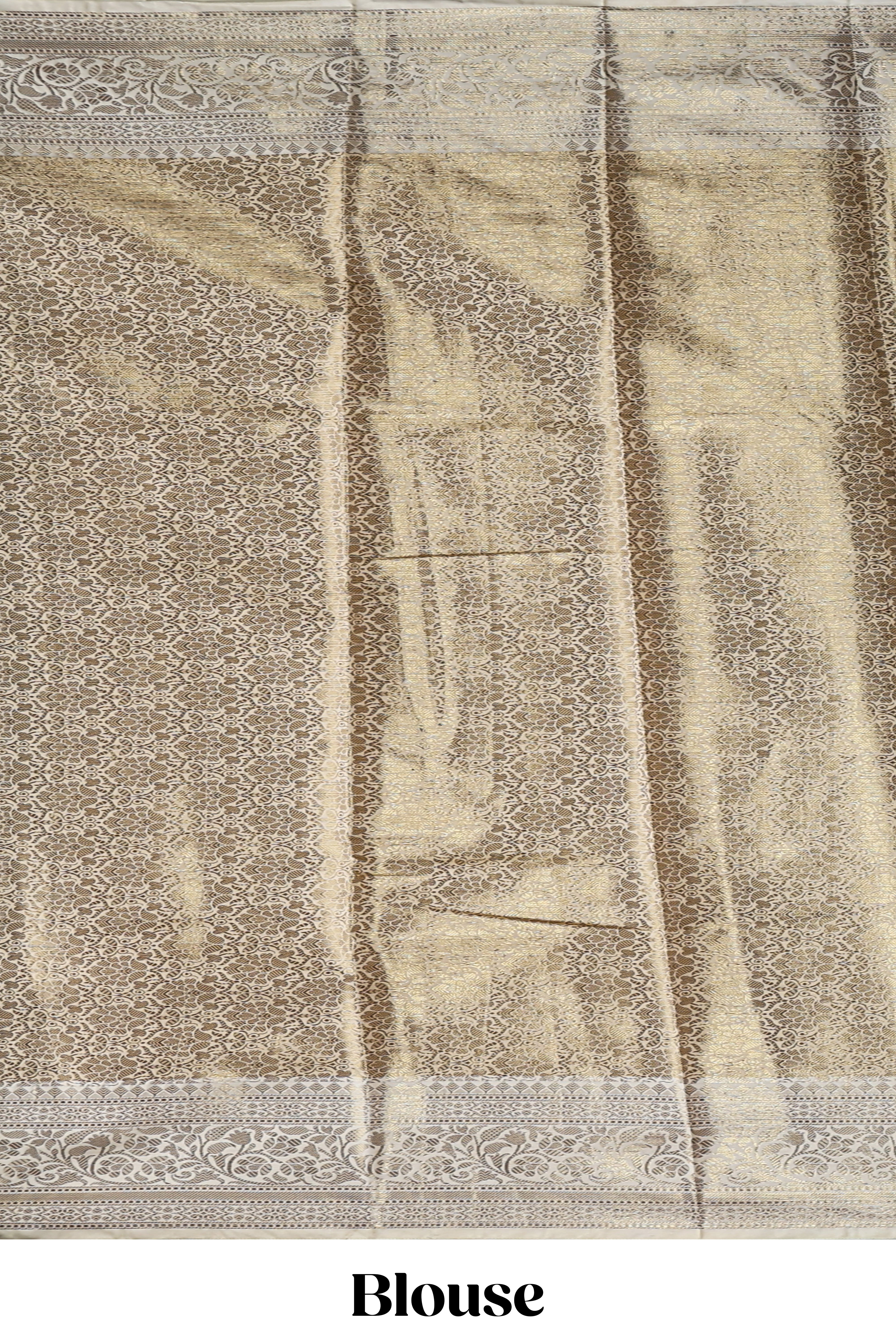 Green checked zari motifs design art tissue saree with self zari border and contrast motifs blouse