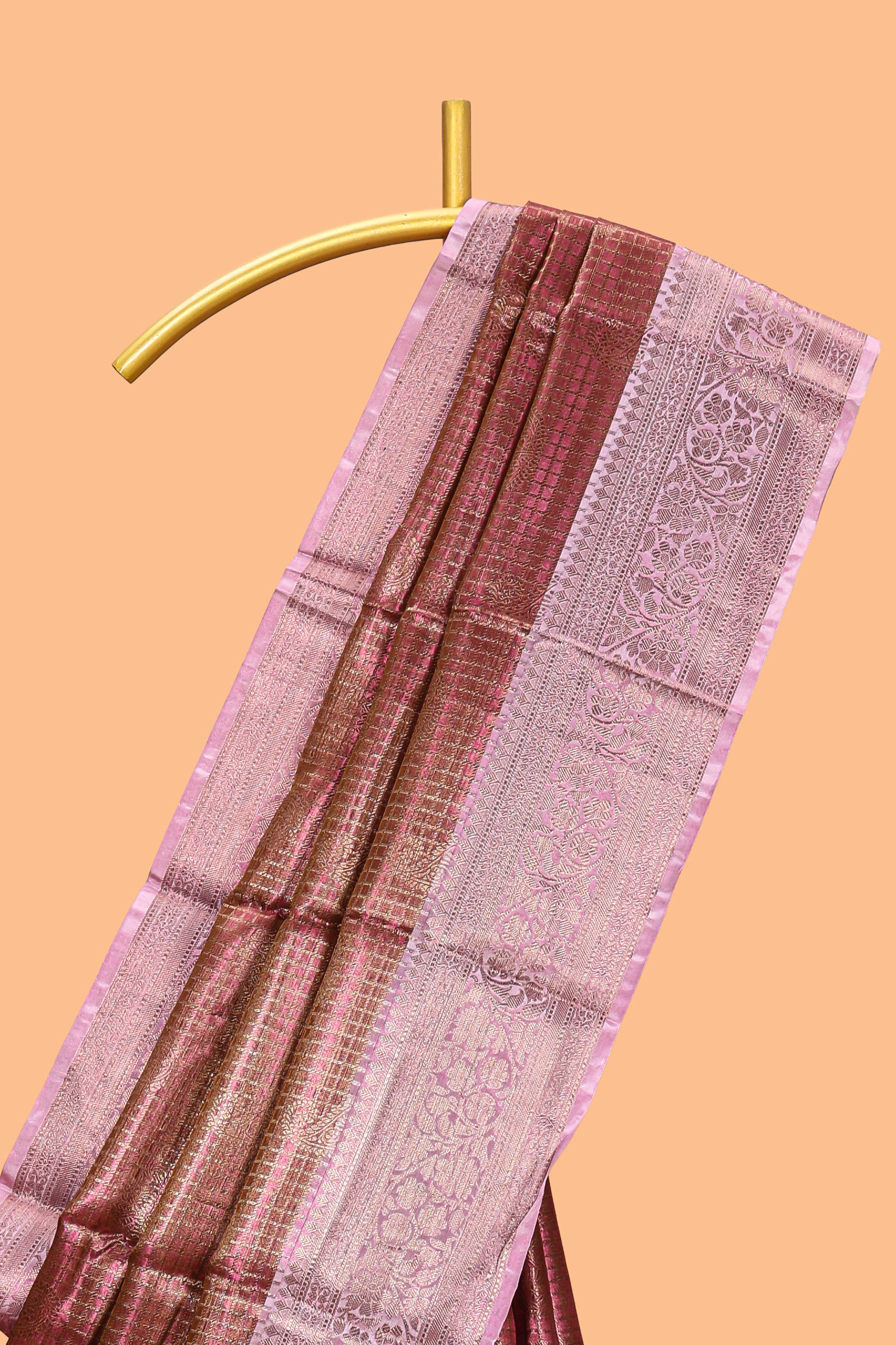 Pink checked zari motifs design art tissue saree with self zari border and contrast motifs blouse