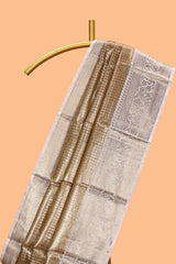 Golden beige checked zari motifs design art tissue saree with contrast zari border and matching printed blouse