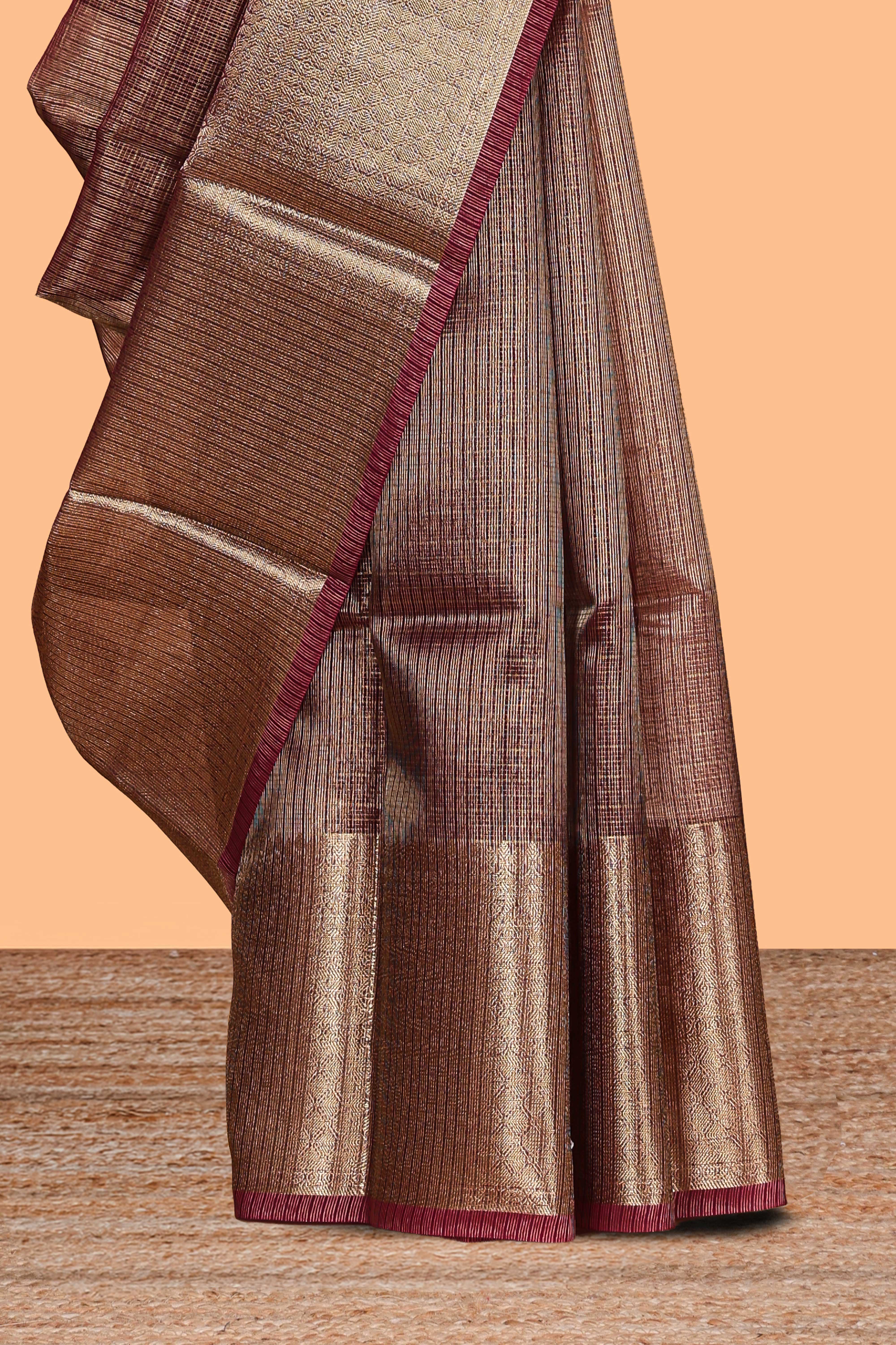 Dark maroon unique zari design art tissue saree with self zari border and matching blouse