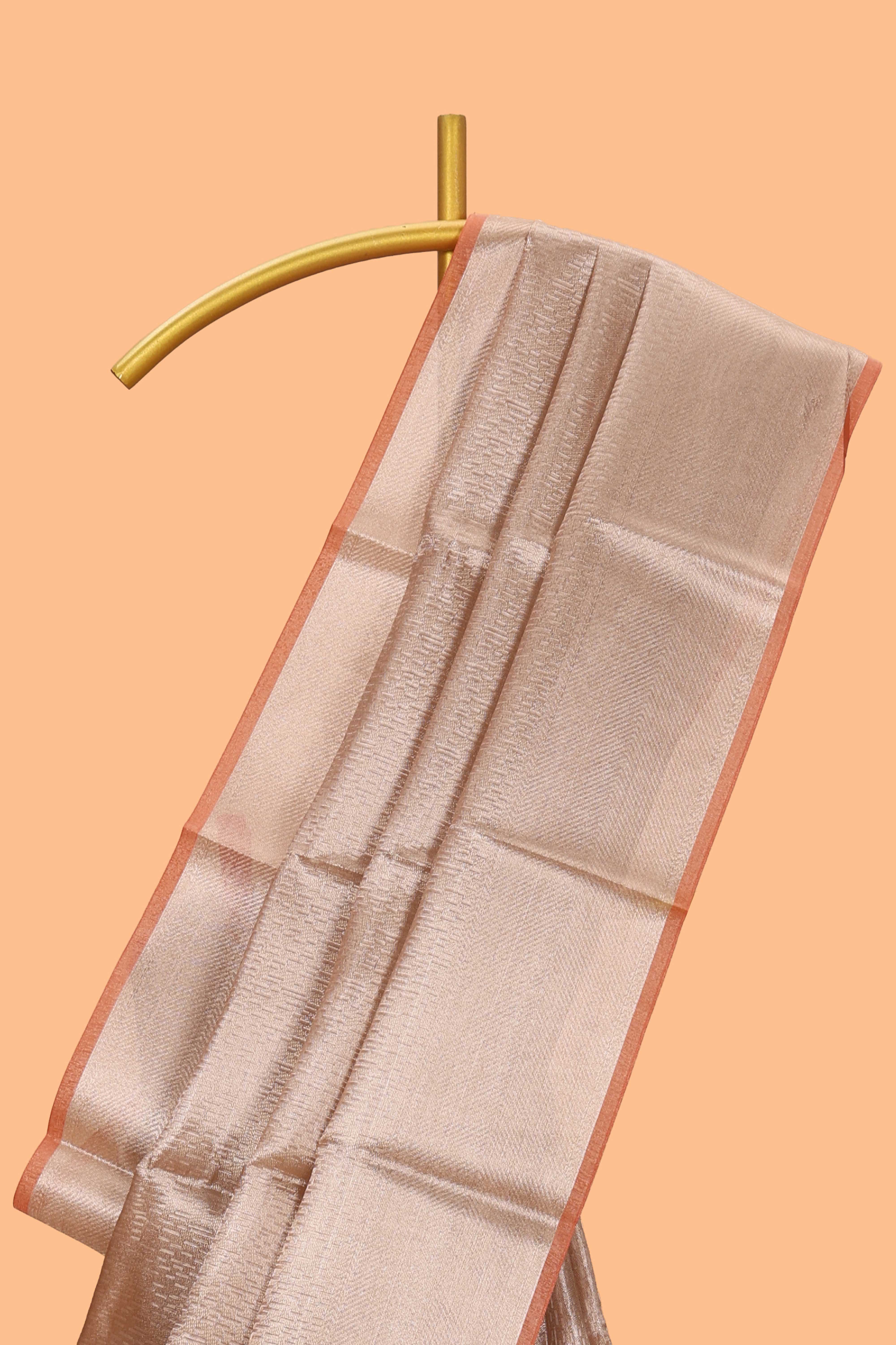 Beige geometric zari design art tissue saree with self zari border and matching blouse