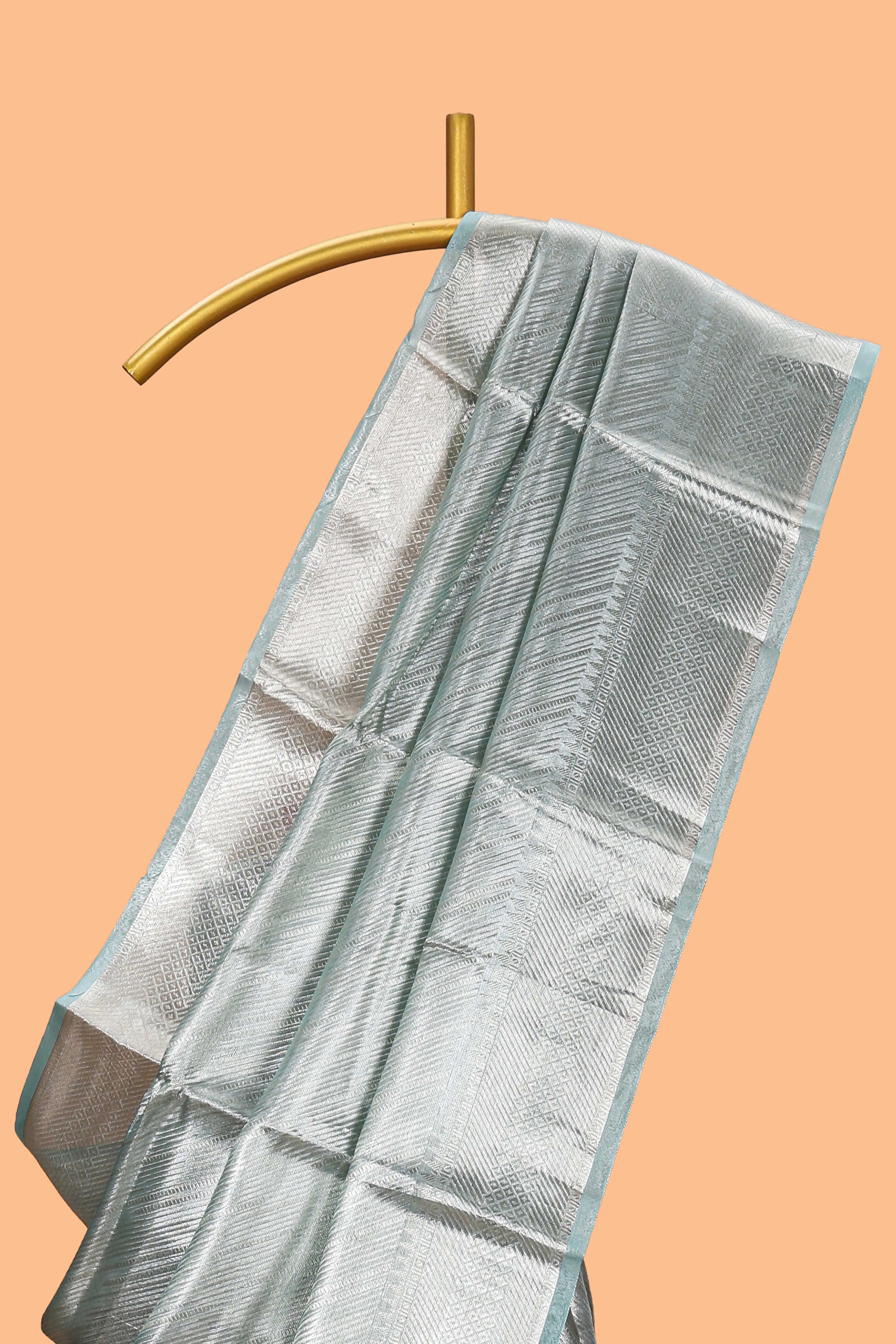 Pastel green vertical striped design art tissue saree with self zari border and matching blouse