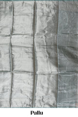 Pastel green vertical striped design art tissue saree with self zari border and matching blouse