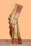 Mustard yellow geometric design art tissue saree with contrast zari border and blouse