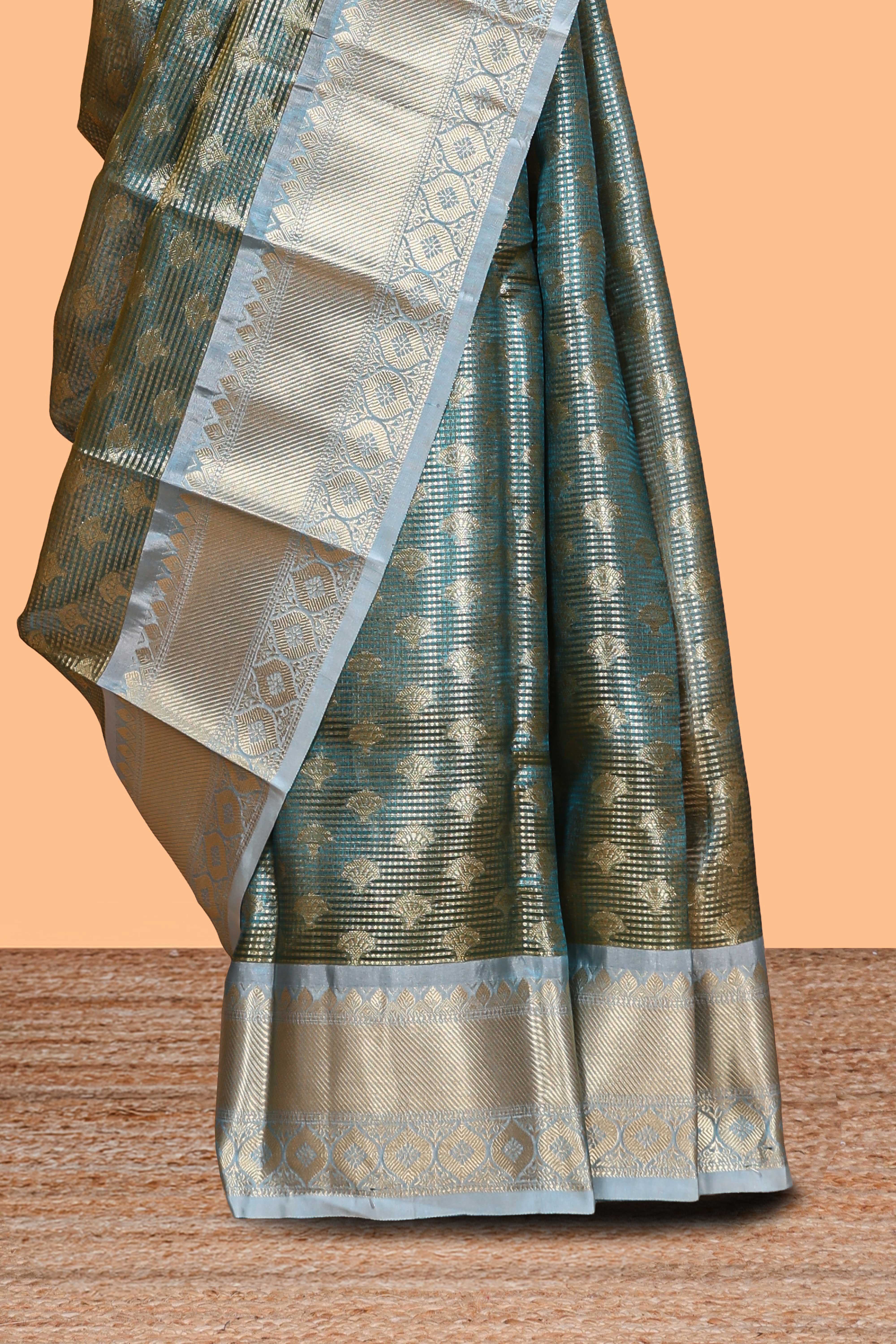 Blue unique design zari motifs art tissue saree with contrast border and blouse