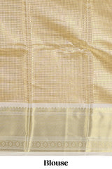 Gold small zari checks design art tissue saree with contrast border and blouse