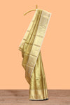 Pale gold small zari checks design art tissue saree with self border and blouse