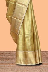 Pale gold small zari checks design art tissue saree with self border and blouse