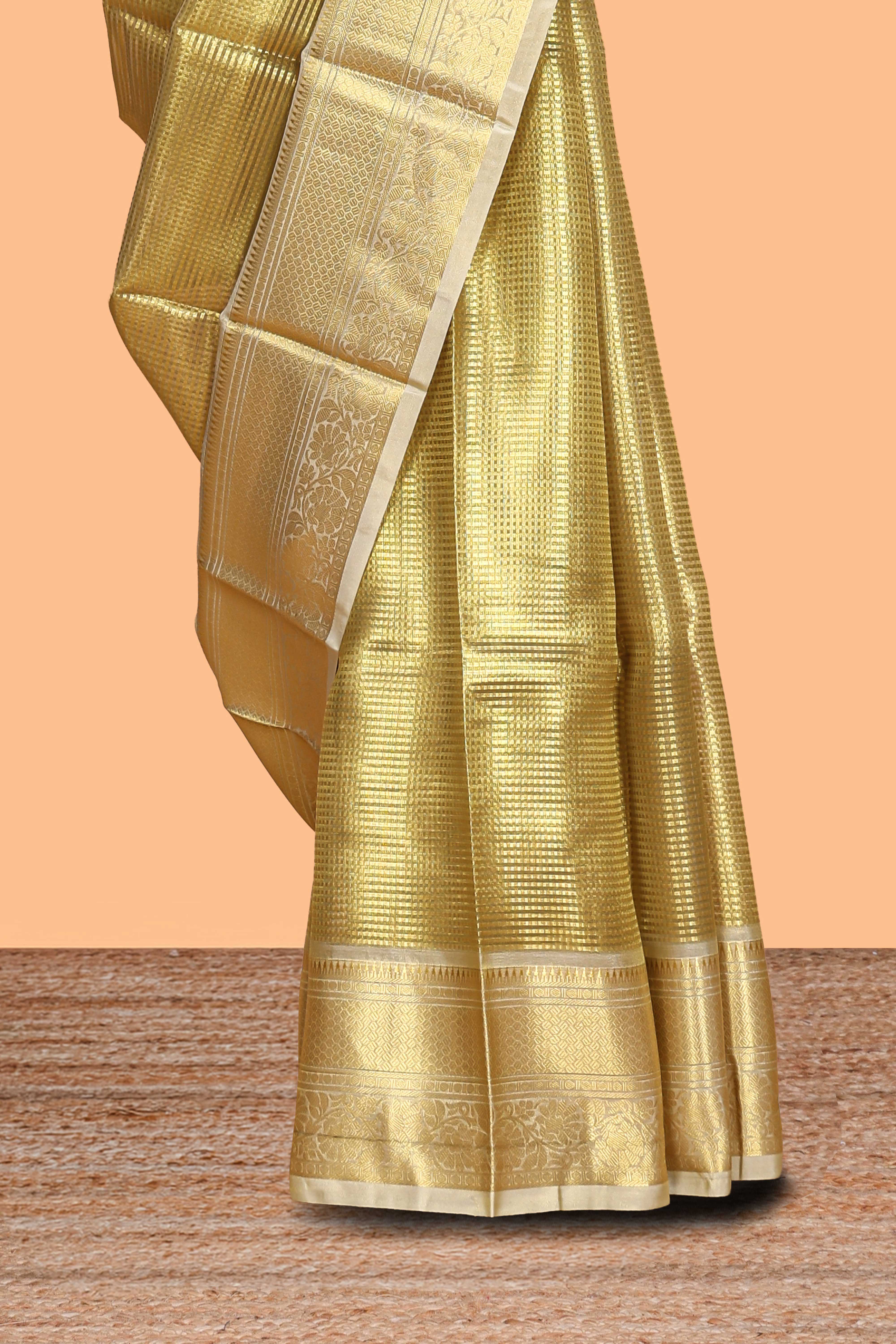 Pale gold small zari checks design art tissue saree with self border and blouse