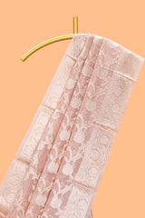 Warm peach floral vine design art tissue saree with zari work border and blouse