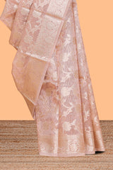 Warm peach floral vine design art tissue saree with zari work border and blouse