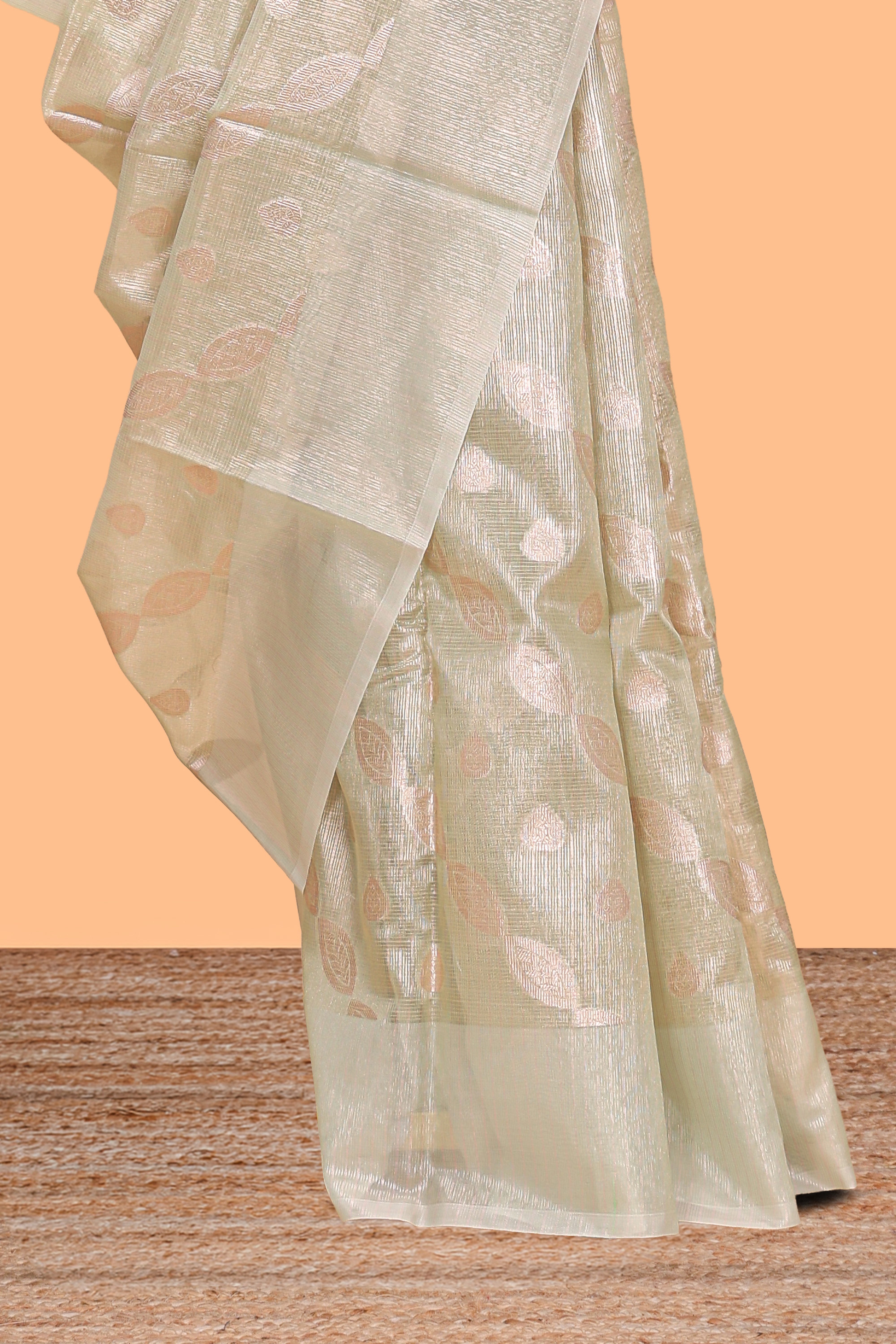 Mint green scattered floral and leaf motifs art tissue saree with self pallu and plain border