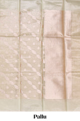 Mint green scattered floral and leaf motifs art tissue saree with self pallu and plain border