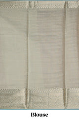 Mauve shade art tissue saree with antique gold zari border and contrast blouse