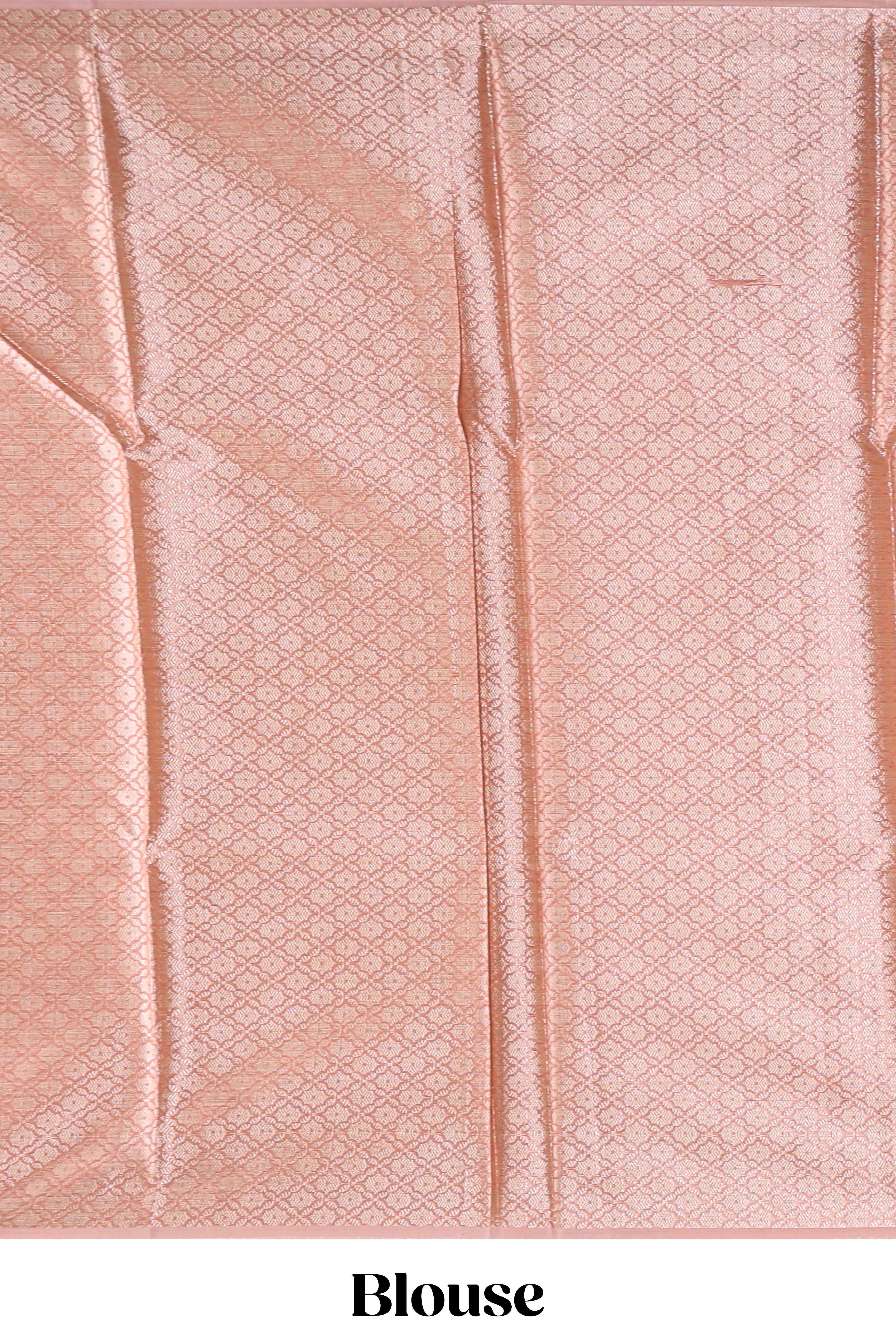 Peach color geometric design art tissue saree with contrast zari border and matching blouse