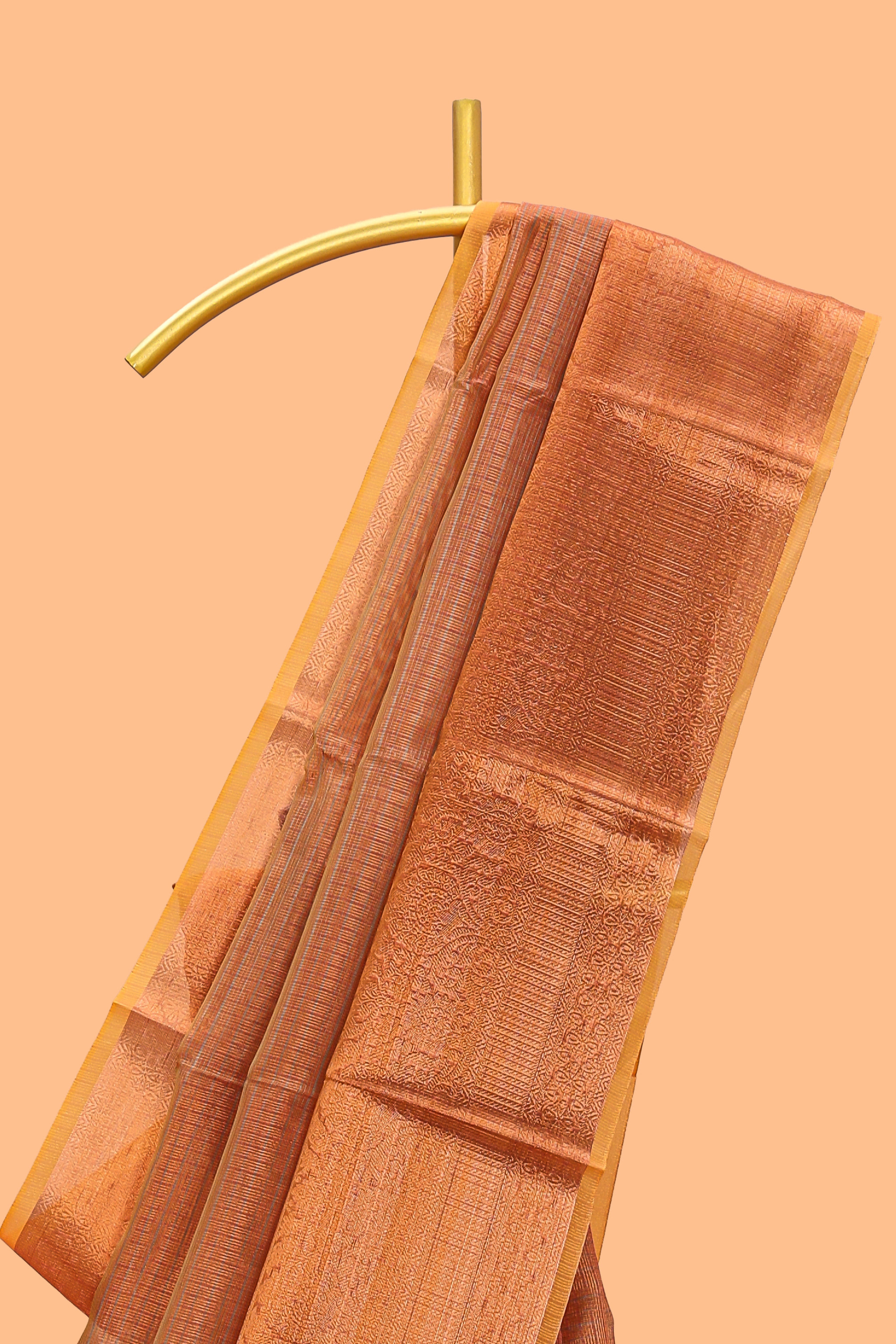 Rust orange checked art tissue saree with contrast zari border and matching blouse