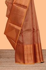 Rust orange checked art tissue saree with contrast zari border and matching blouse